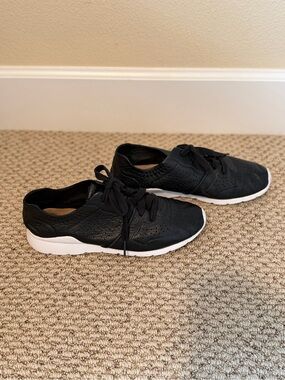 UGG Women’s Black Sneakers with White Soles
